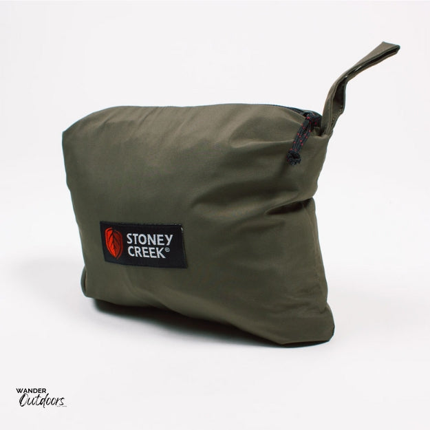 Stoney Creek Stow It Jacket Gumleaf folded into the front pocket