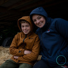 Kid & Mum wearing the roaster jacket on the farm.
