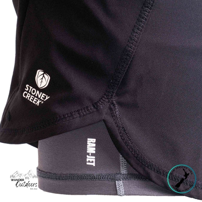 Close-up of black shorts with Stoney Creek logo and Ramjet branding on a white background.