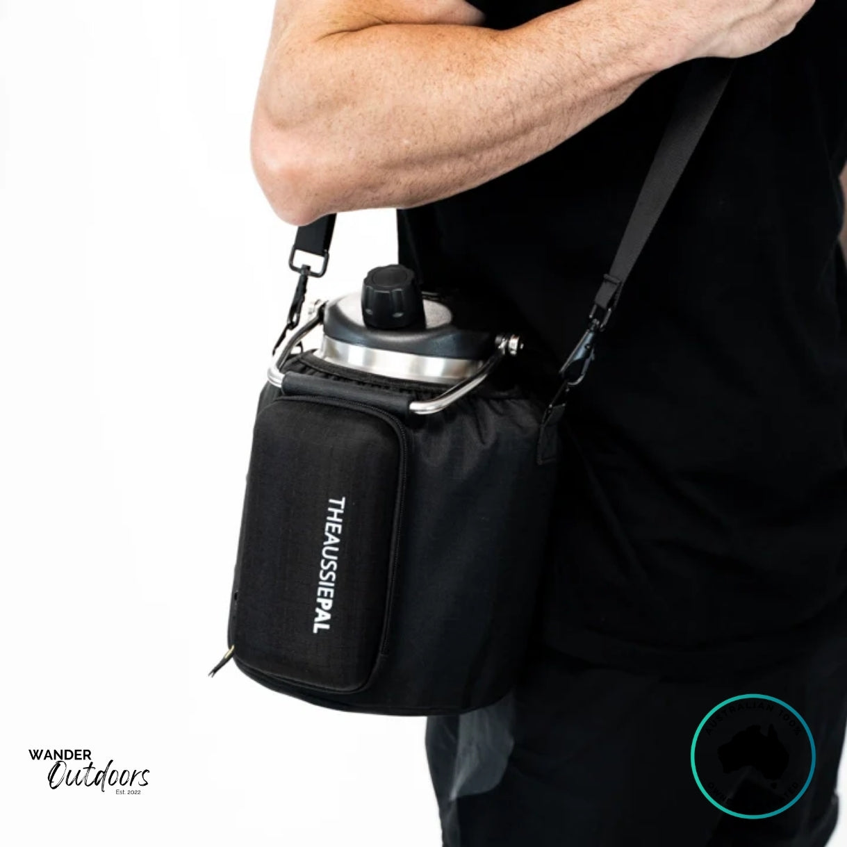The Aussie Pal 4L Hydro Jug Bottle Sling in classic black with adjustable shoulder strap, zip pockets, and snug fit around jug.