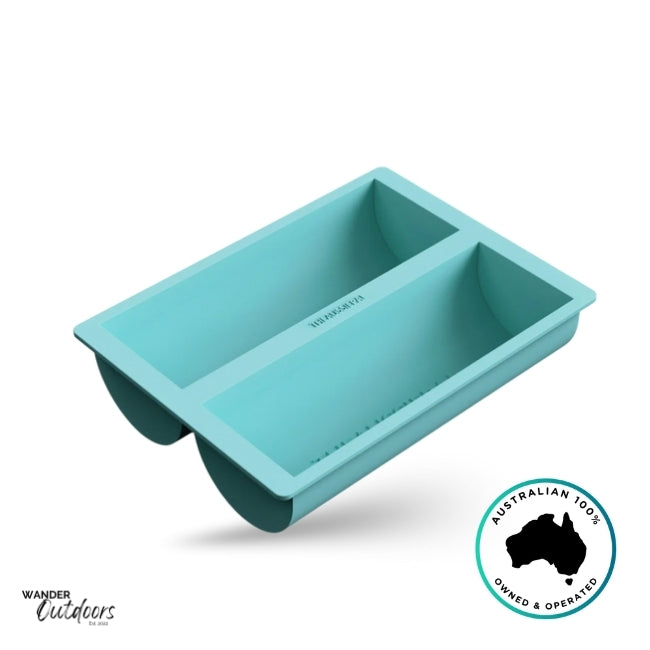 Aqua blue Aussie Pal Perfect-Fit Ice Tray shown with two frozen half-cylinder ice blocks, demonstrating fit for 1L and 2L Hydro Jugs. Wander Outdoors and Australian Owned logos visible.