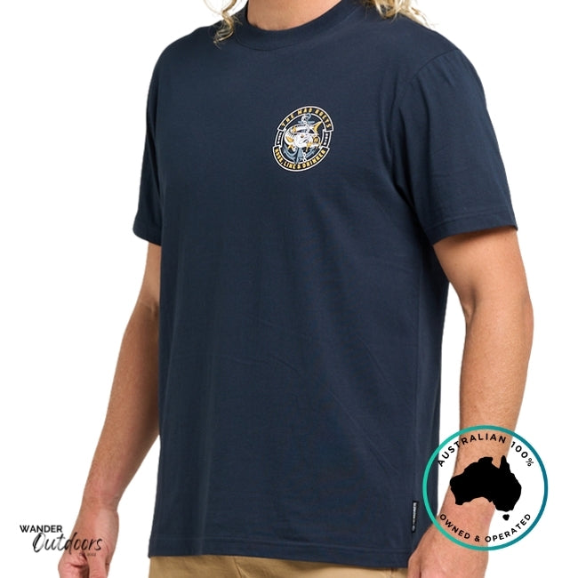 Person wearing a navy blue t-shirt with a logo on a white background