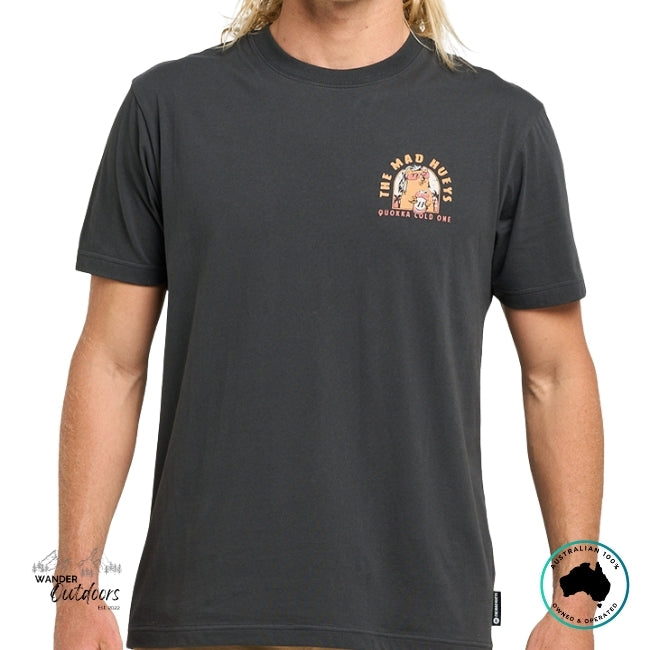 Person wearing a vintage black t-shirt with a The Mad Hueys Logo and a Quokka character.