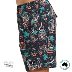 Tropical patterned shorts with ship and palm tree design on a white background