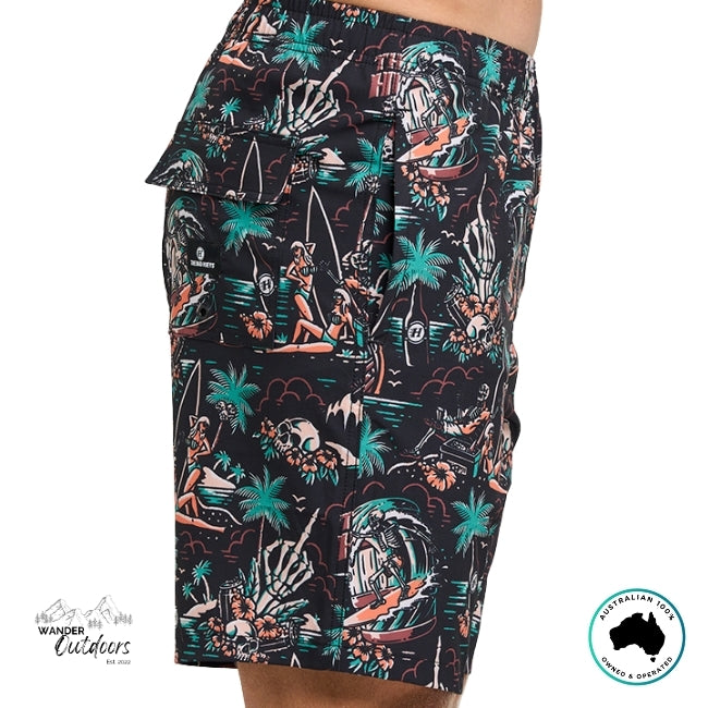 Tropical patterned shorts with The Mad Hueys Logo on a white background