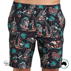 Colorful patterned shorts with 'The Mad Hueys' branding on a white background