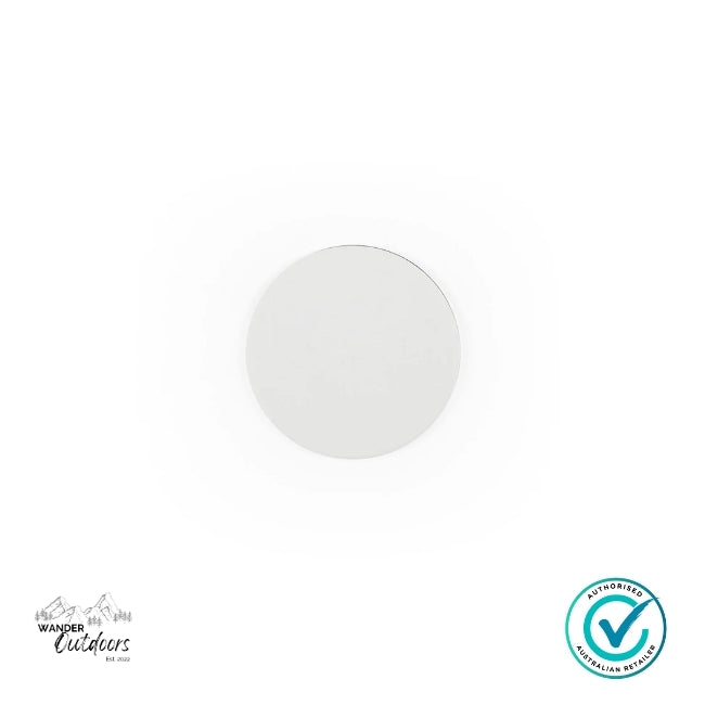 White circular object on a white background with a brand logo in the corner.