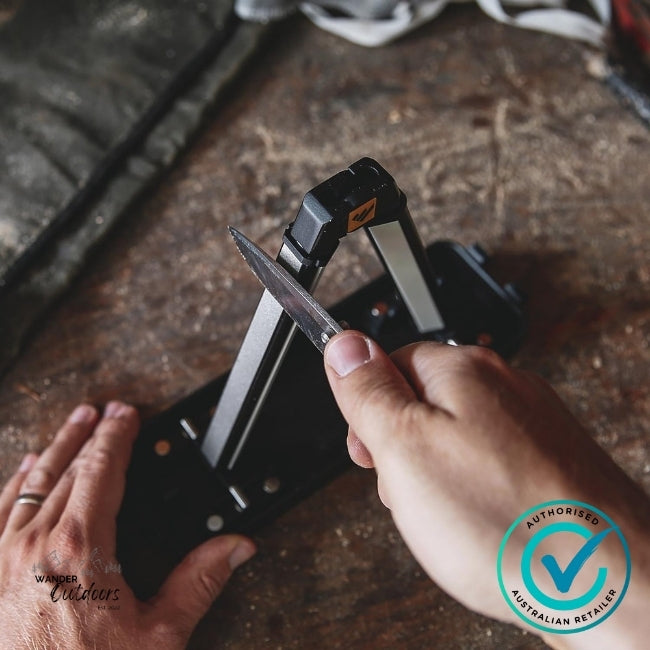 Sharpening a fixed blade knife on the Work Sharp WSBCHAGS Angle Set Sharpener using the guided angle rods – Wander Outdoors authorised Australian retailer.