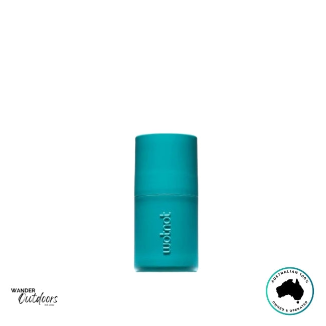 Front view of Wotnot Refillable Sunscreen Roll-On Applicator in aqua blue, featuring compact travel-friendly design.