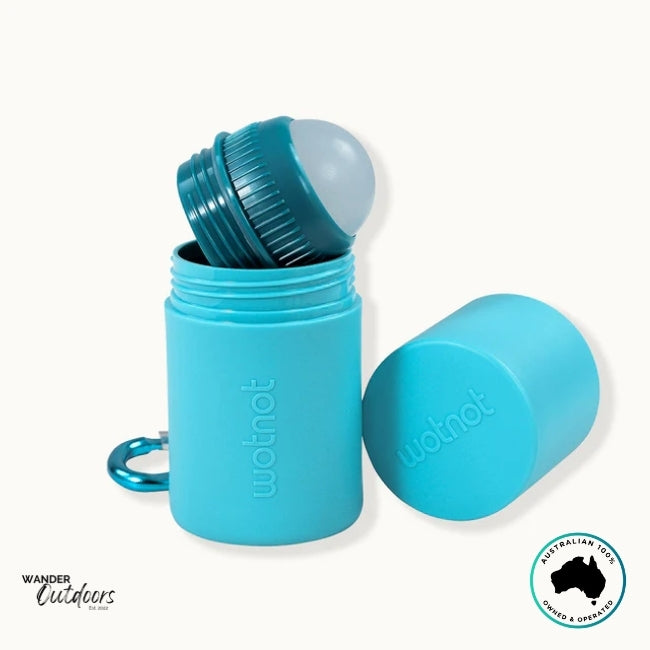 Open Wotnot Refillable Sunscreen Roll-On Applicator showing removable roller section and cap components.